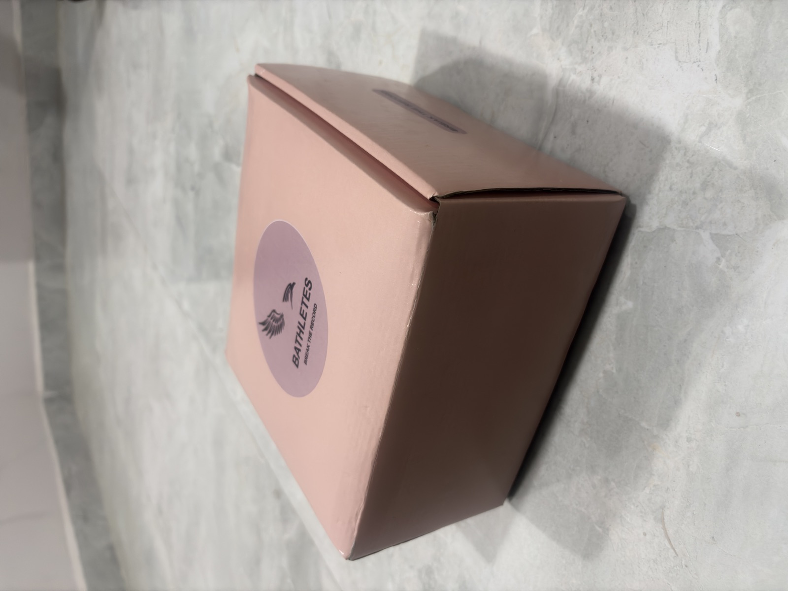 Side view of the BATHLETES packaging