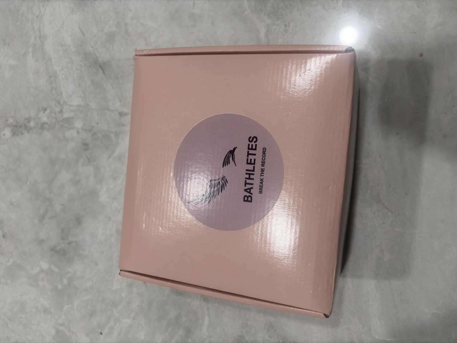 BATHLETES box with falcon logo and Break the Record tagline